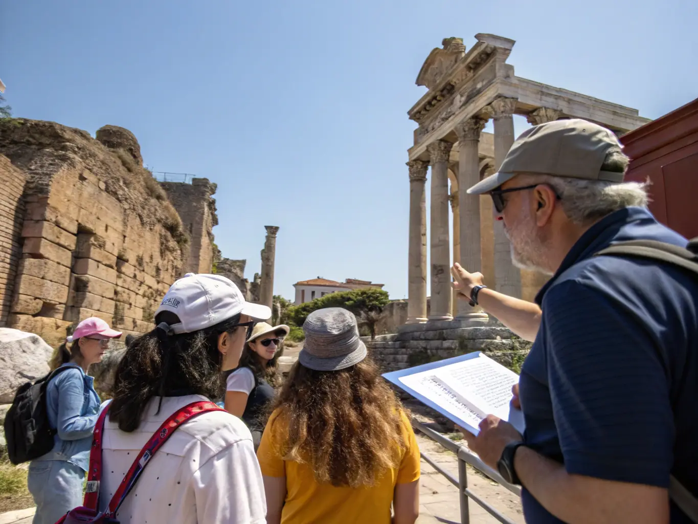 A photograph of participants on a guided tour of a historical site, showcasing CSQNP's cultural heritage tours.